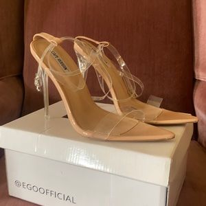 Sexy strappy nude and clear heels.